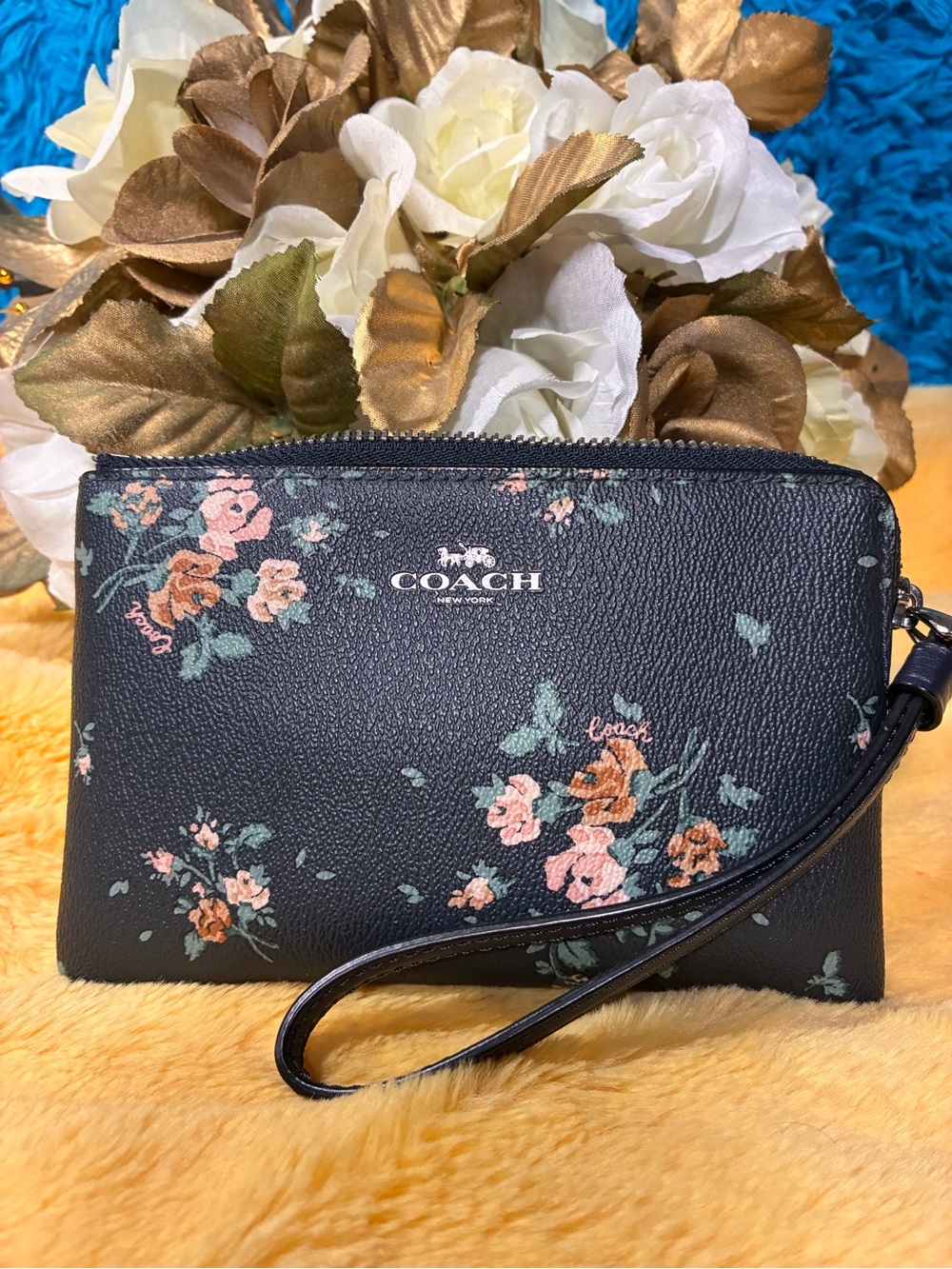Coach Black Floral Leather Wristlet with Pink and Green Accents